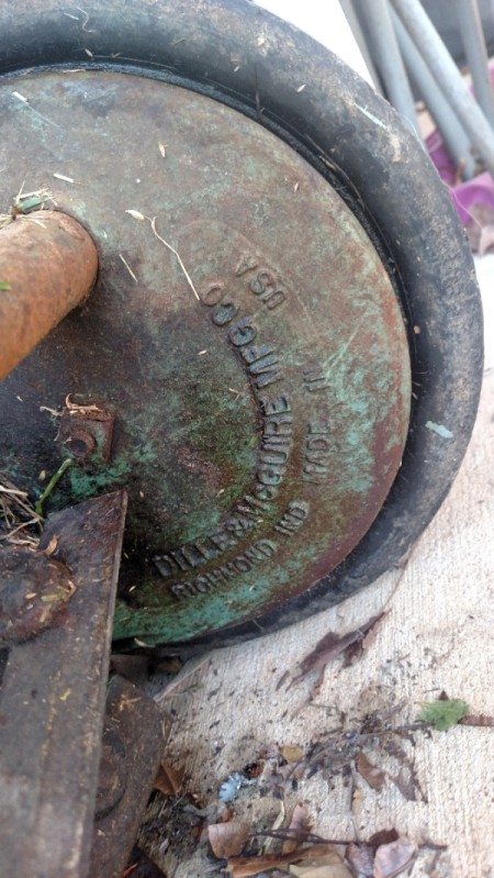 Value of an Old Reel Mower - text casting on inside of wheel