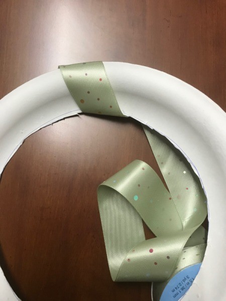 Inexpensive Ribbon Wreath  - tape ribbon to plate wreath and begin wrapping