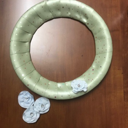Inexpensive Ribbon Wreath  - adding flowers