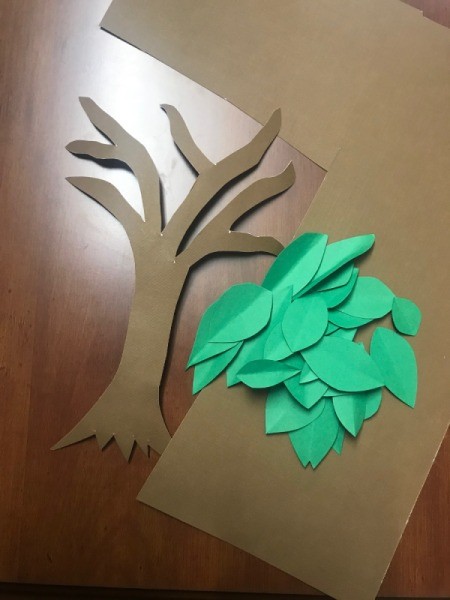 Thankful Tree - bare tree with pile of leaves