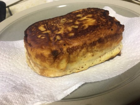 sandwich on paper towel on plate