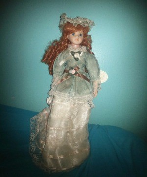 Value of a Knightsbridge Collection Porcelain Doll - red haired doll