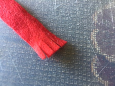 Upcycled Light Bulb Penguin - make red felt frayed scarf