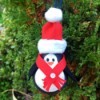 Upcycled Light Bulb Penguin - ornament hanging on tree
