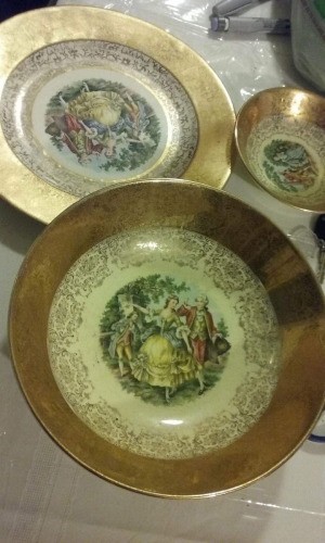 Determining the Value of China Plates - gold trimmed china plates with painted people in center