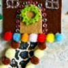 Gingerbread House Christmas Collage - closeup of house with pom poms, and path, and wreath details