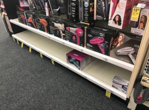 An empty shelf for an item on sale.