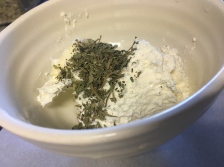 mixing garlic and herb filling