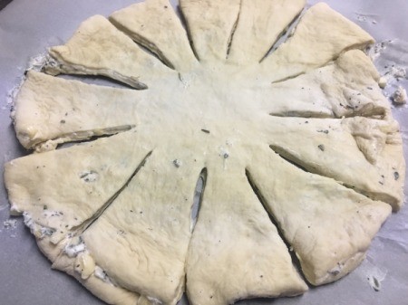 cutting more slits in doubled dough