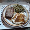 meatloaf, mashed potatoes, green beans on plate