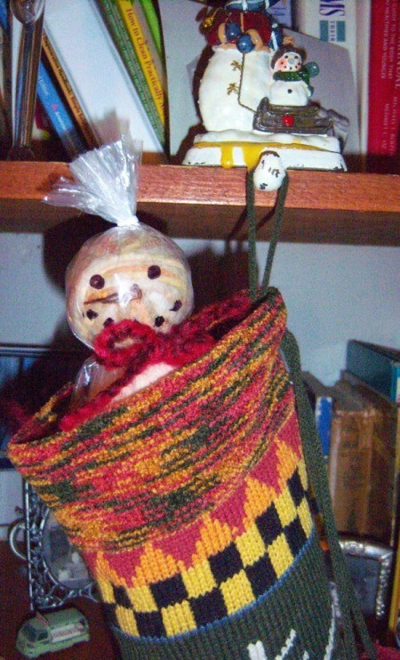 Dryer Ball Snowman Stocking Stuffer - snowman's head peeking out of stocking