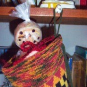 Dryer Ball Snowman Stocking Stuffer - snowman's head peeking out of stocking