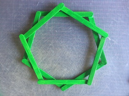 Popsicle Stick Wreath - glue a second pentagon on top of the first - turned slightly
