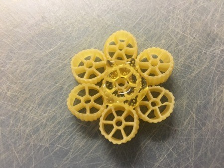 Pasta Christmas Ornaments - for small snowflake glue 6 rotelle pasta pieces around one in the center