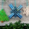 Pasta Christmas Ornaments - ornaments against a wood background