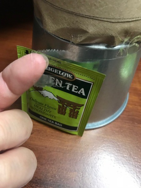 Christmas Tea Tree - starting at the bottom begin gluing the tea packets to the pot