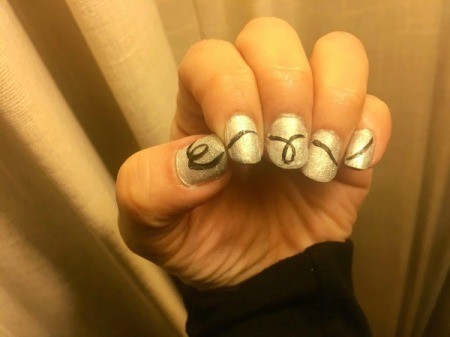 String of Lights Nail Art - with thin brush paint a string from your thumb to your pinkie looping of effect