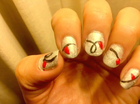 String of Lights Nail Art - add dabs of colored paint and pull upwards with a dotting tool or toothpick