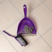 Sweeping up Dust and Hair from Floor