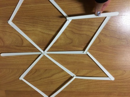 Stick and Yarn Snowflake Decoration - arrange sticks in any snowflake design