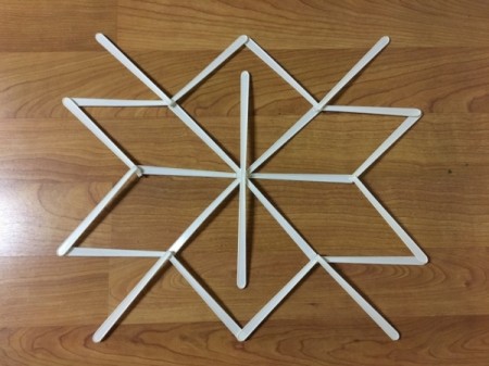 Stick and Yarn Snowflake
Decoration - glue more sticks