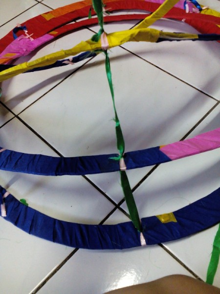 DIY Hanging Cardboard Christmas Tree - use 3-4 inch pieces for ribbon to tie the rings together