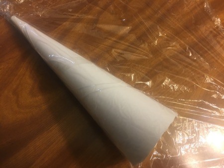 Mini String Christmas Tree - wrap with plastic wrap and tuck excess into the paper cone