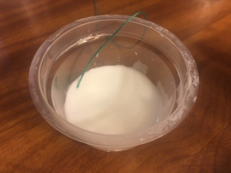 Mini String Christmas Tree - start soaking the string in the mixture a section at a time