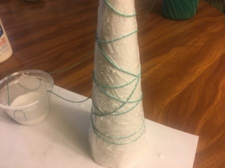 Mini String Christmas Tree - continue soaking the string and wrapping it up and down the cone randomly