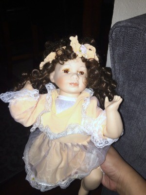 Value of Porcelain Dolls - doll with dark ringlets
