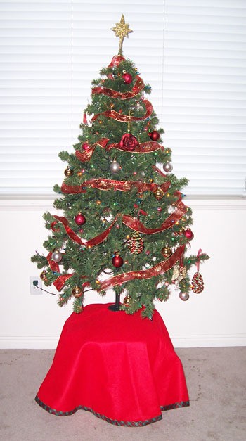 A tree on a high table.