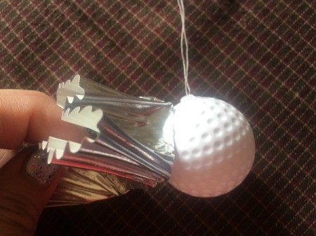 Cupcake Liner Ornament - add hot glue to the base of the liner and stick to ball, continue around