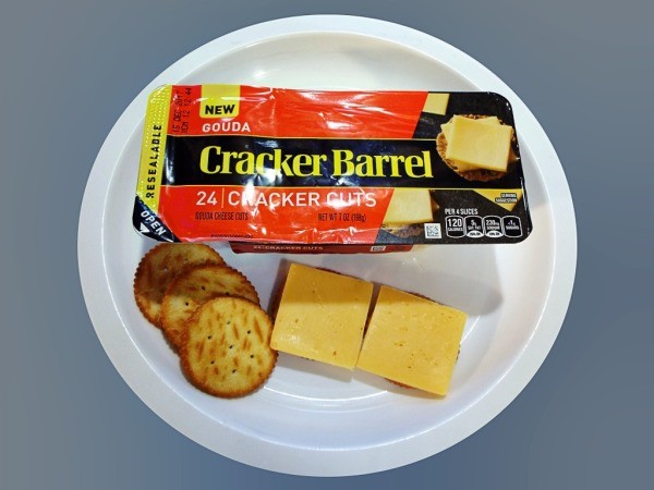 A package of Cracker Barrel gouda cheese.