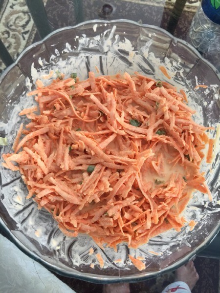 mixed grated sweet potato, green onions and batter