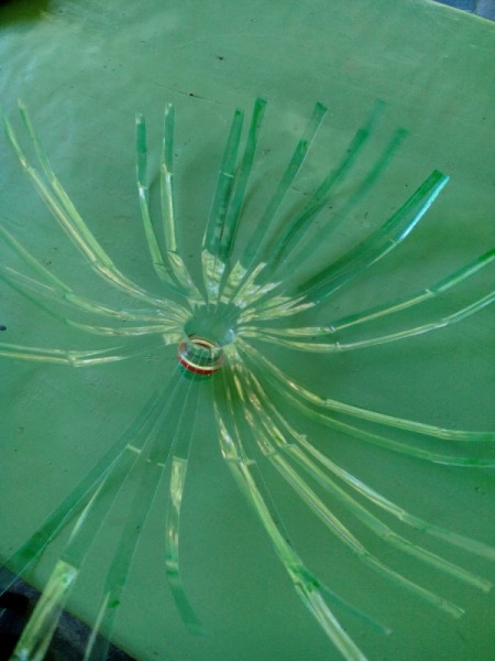 Plastic Bottle Christmas Tree - press the strips down