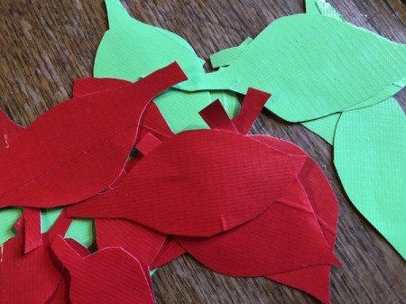 Making a Duct Tape Poinsettia - flip the pages over and cut out all of the leaves