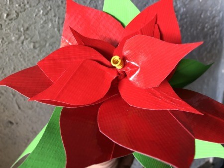 Making a Duct Tape Poinsettia - slip spiral on the top of the stick in the space left