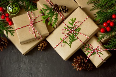 Christmas packages under a tree.