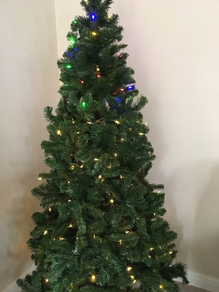 Setting Light Colors on a Pre-lit Christmas Tree - top lights colored an bottom are white