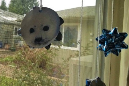 Christmas Card and Bow Window Decoration - closeup of decorations