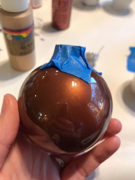 Poured Paint Ornaments  - ball with tape over the top opening