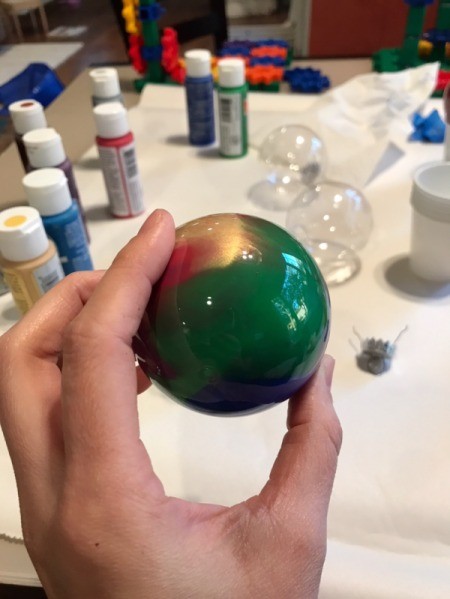 Poured Paint Ornaments - green bottom of swirled ball