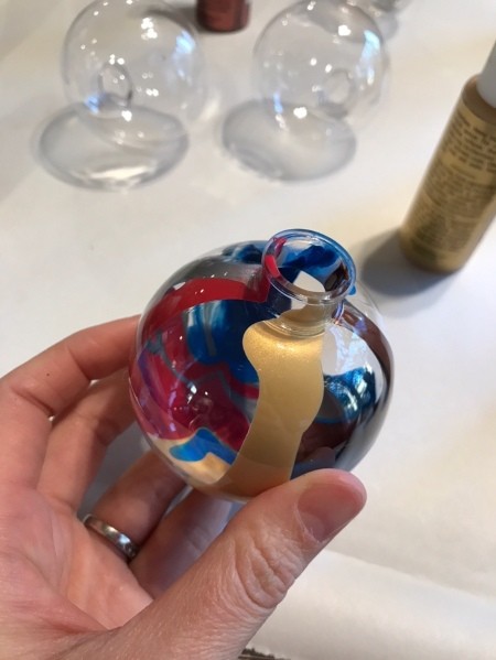 Poured Paint Ornaments  - several colors of paint dripped down the inside of the ornament