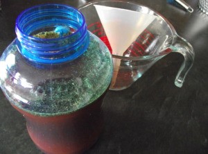 mixing vegetable juice in jar