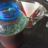 mixing vegetable juice in jar