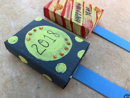 Snack Box New Year's Noisemakers - allow the glue to dry for at least 10 minutes