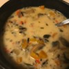 A bowl of mushroom and wild rice soup cooked in an Instant Pot pressure cooker.