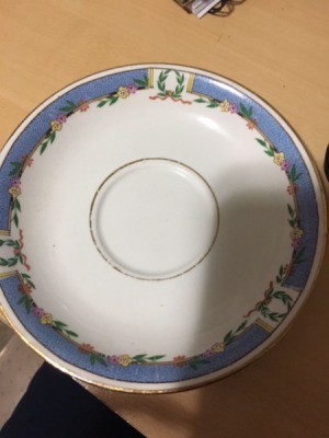 Value of English Dinnerware - white china with blue around the edge and flowers