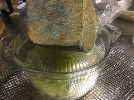 weight on bowl over watermelon Rind Pickles