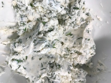 basil and cheeses mixed
